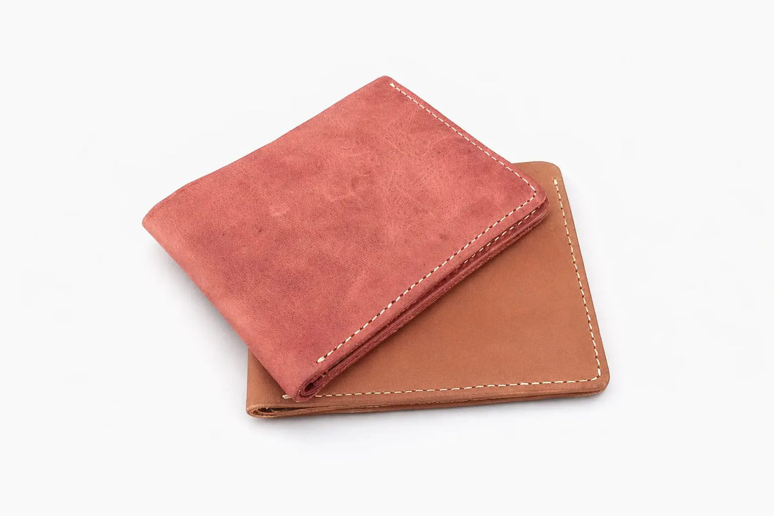 Minimalist handmade-style slim wallet with rustic stitching and card pockets