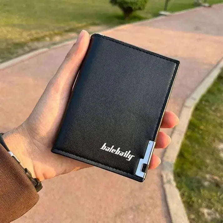 Men's bifold wallet with metal corner accent, ID window, card slots and cash storage