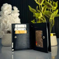 Men's bifold wallet with metal corner accent, ID window, card slots and cash storage