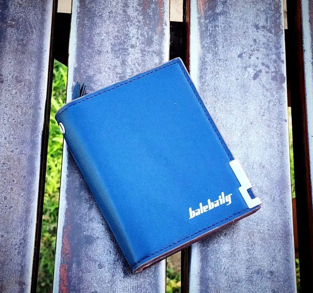 Men's bifold wallet with metal corner accent, ID window, card slots and cash storage